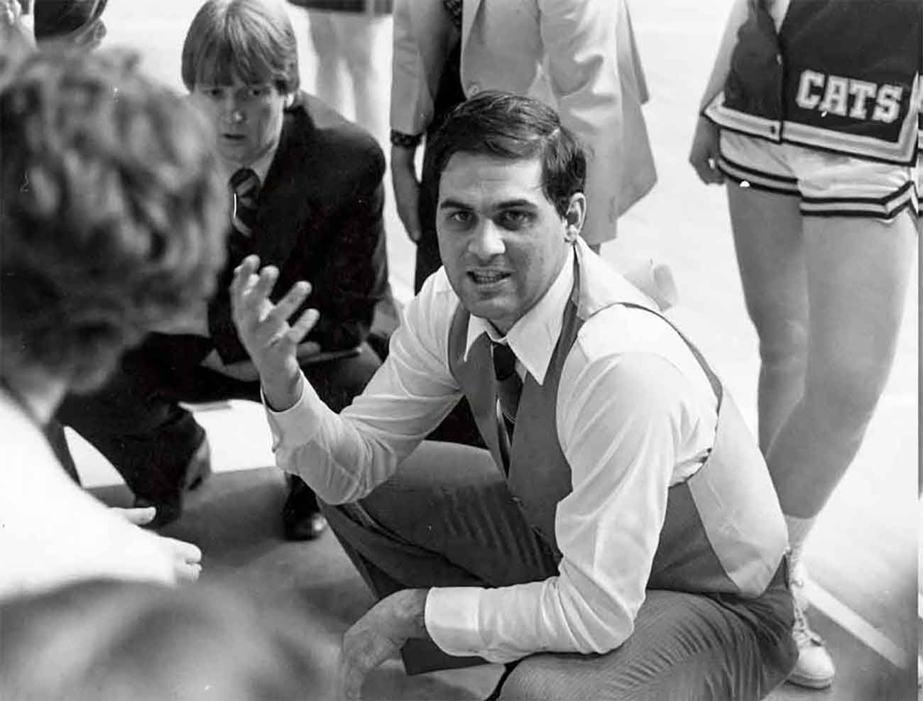 Black and white photo of Harry Perretta in his early years of coaching