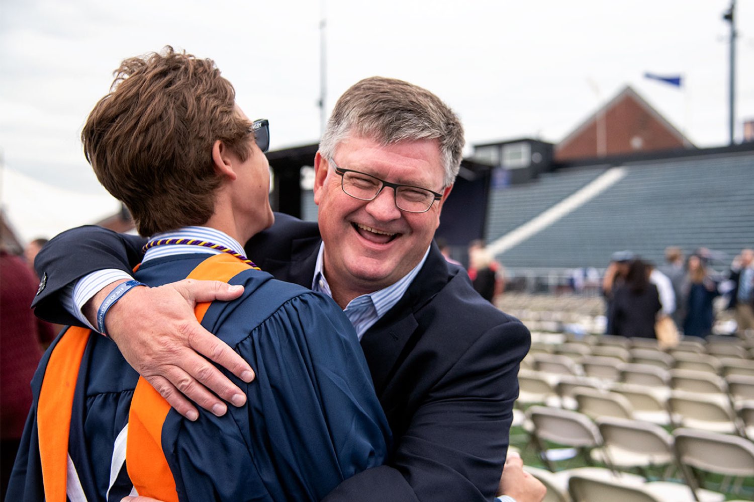 Man embracing a new Villanova graduate.