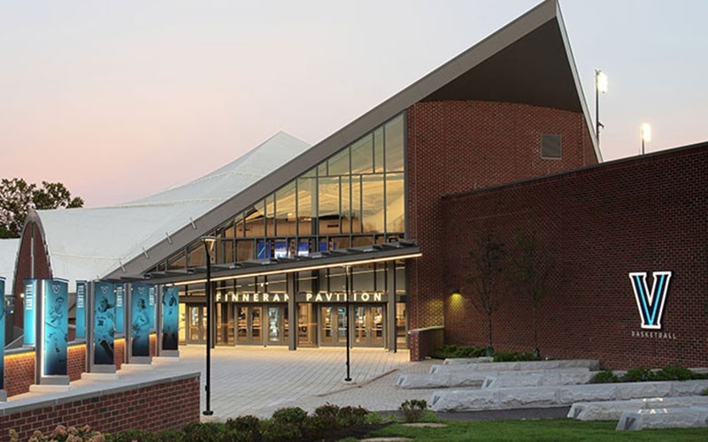 The outside of the Finneran Pavilion at night. 