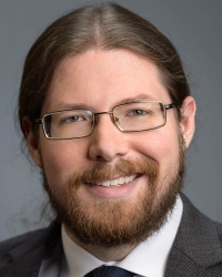 Andrew-Mazar Headshot of Andrew Mazar.