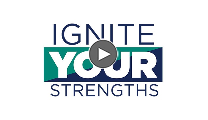 iys-lockup-video-button Screenshot of Ignite Your Strengths logo lockup with play button link to video