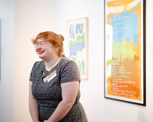 Patrons look at a piece at the exhibit, "Abstract Activism: Sam Maitin's Philadelphia." Patrons look at a piece at the exhibit, "Abstract Activism: Sam Maitin's Philadelphia."