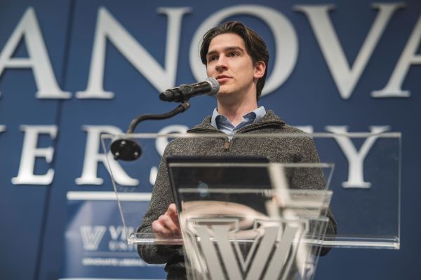 A student presents at the annual Graduate Research Symposium.