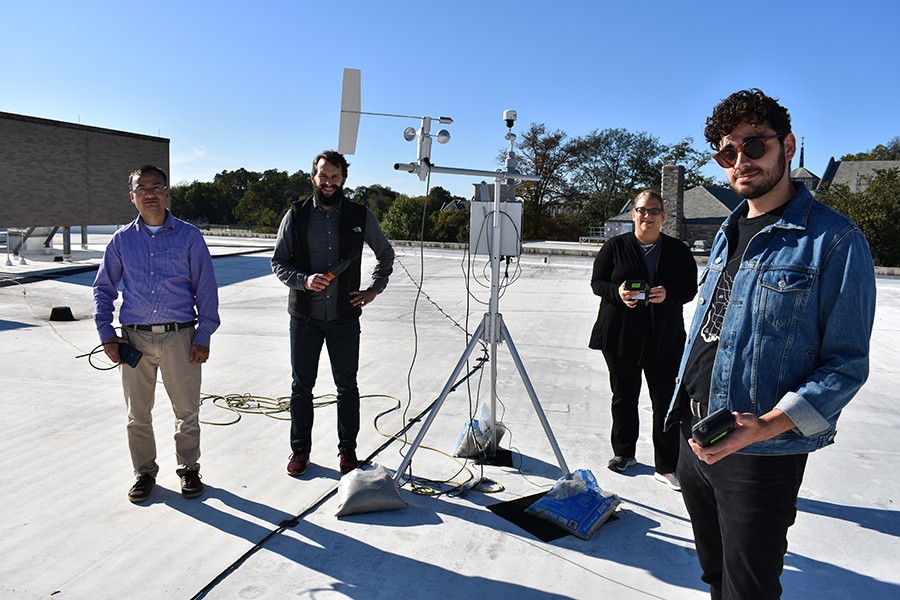 Environmental Science research team with equipment Environmental Science research team with equipment