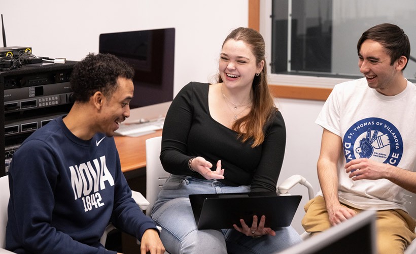 Undergraduate Programs in History Three students sitting and collaborating on History project.