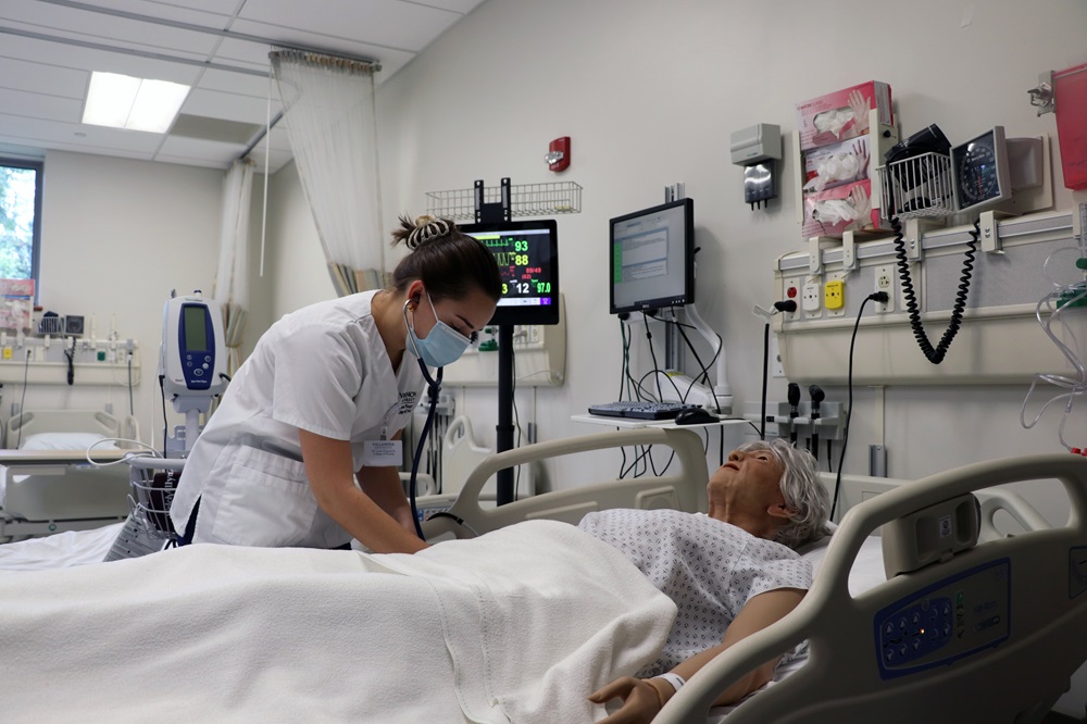 Student at SIM Lab bedside Student at SIM Lab bedside