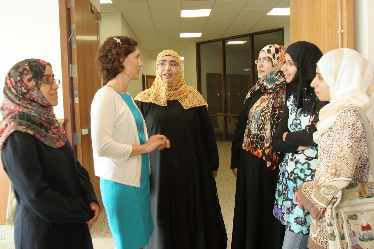Dr Angelina Arcamone with Omani students in Commons_cr Paola Nogueras_DriscollHall_RibbonCutting_141 Dr. Angelina Arcamone with nursing students from Oman