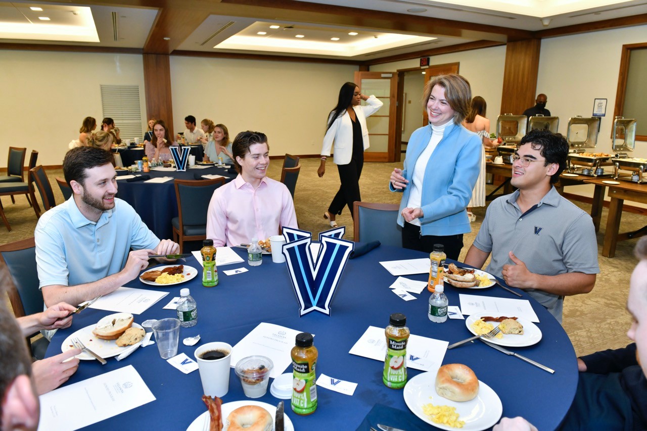 Honors seniors with Director Dr. Anna Moreland