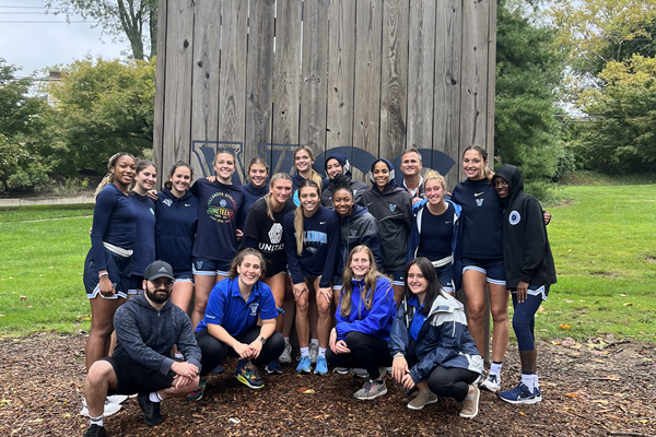 Students pose for a photo after completing the Challenge Course