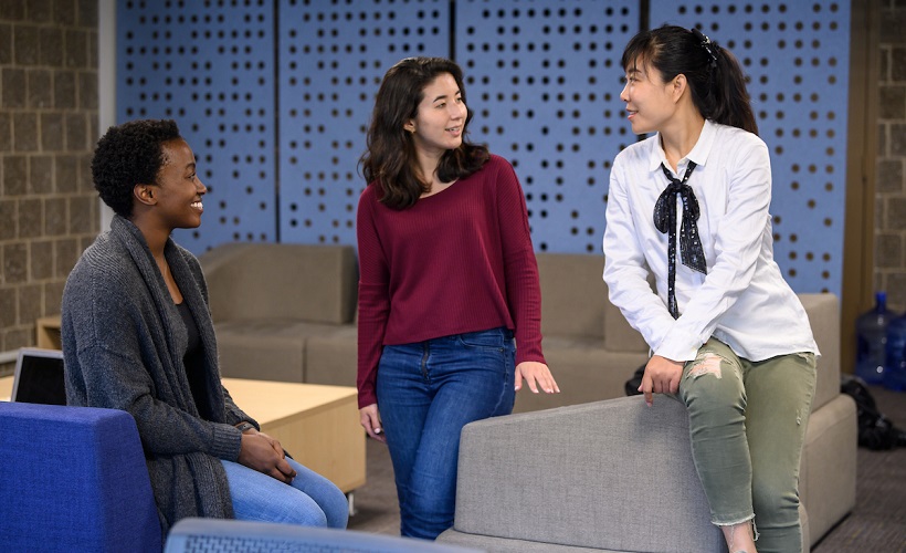 Three female students in Office of International Students